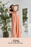 Combinaison en lin de couleur corail.