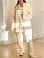 Ensemble gilet cape et pantalon beige