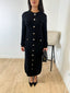 Robe longue a bouton noir