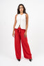 Pantalon large avec nœud à la taille couleur rouge