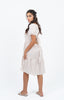 Robe beige clair à carreaux blancs