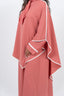 Abaya couleur corail avec cape.