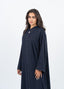 Abaya bleu marine avec incrustations au col.