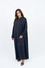 Abaya bleu marine avec incrustations au col.
